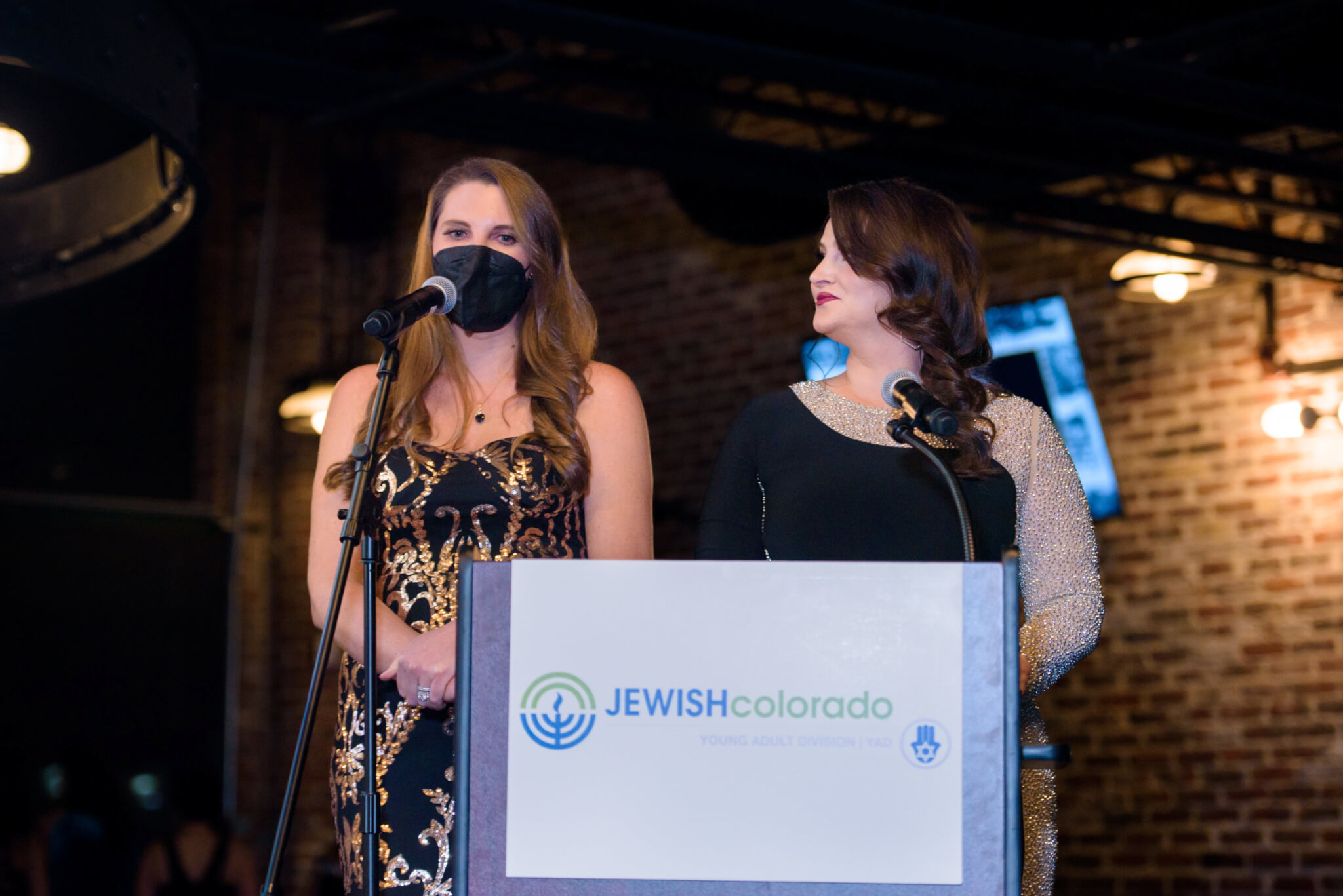 Meryl Suissa and Mallory Grossman speaking at JEWISHcolorado's Young Adult Division's (YAD) Operation ELEVATE 2022