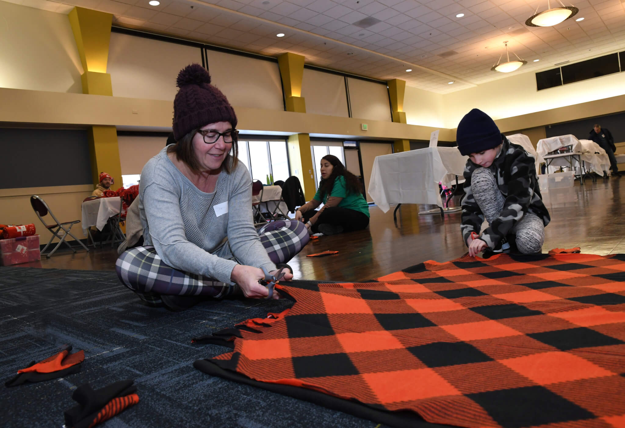 Making a blanket at Christmas Mitzvah family site
