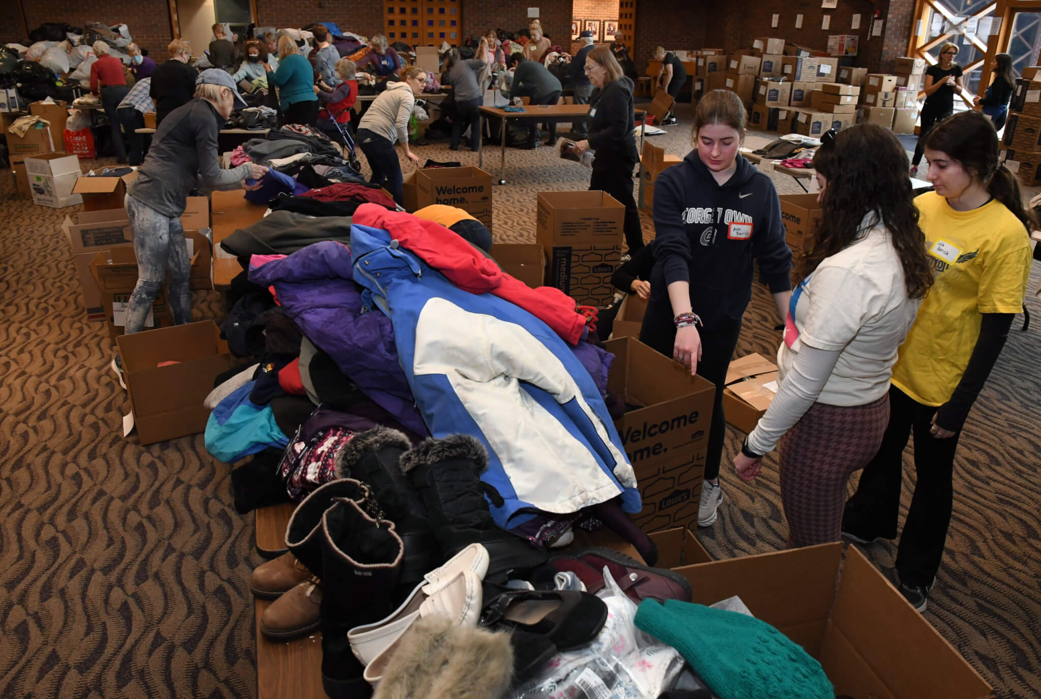 Donations and volunteers in Temple Emanuel social hall