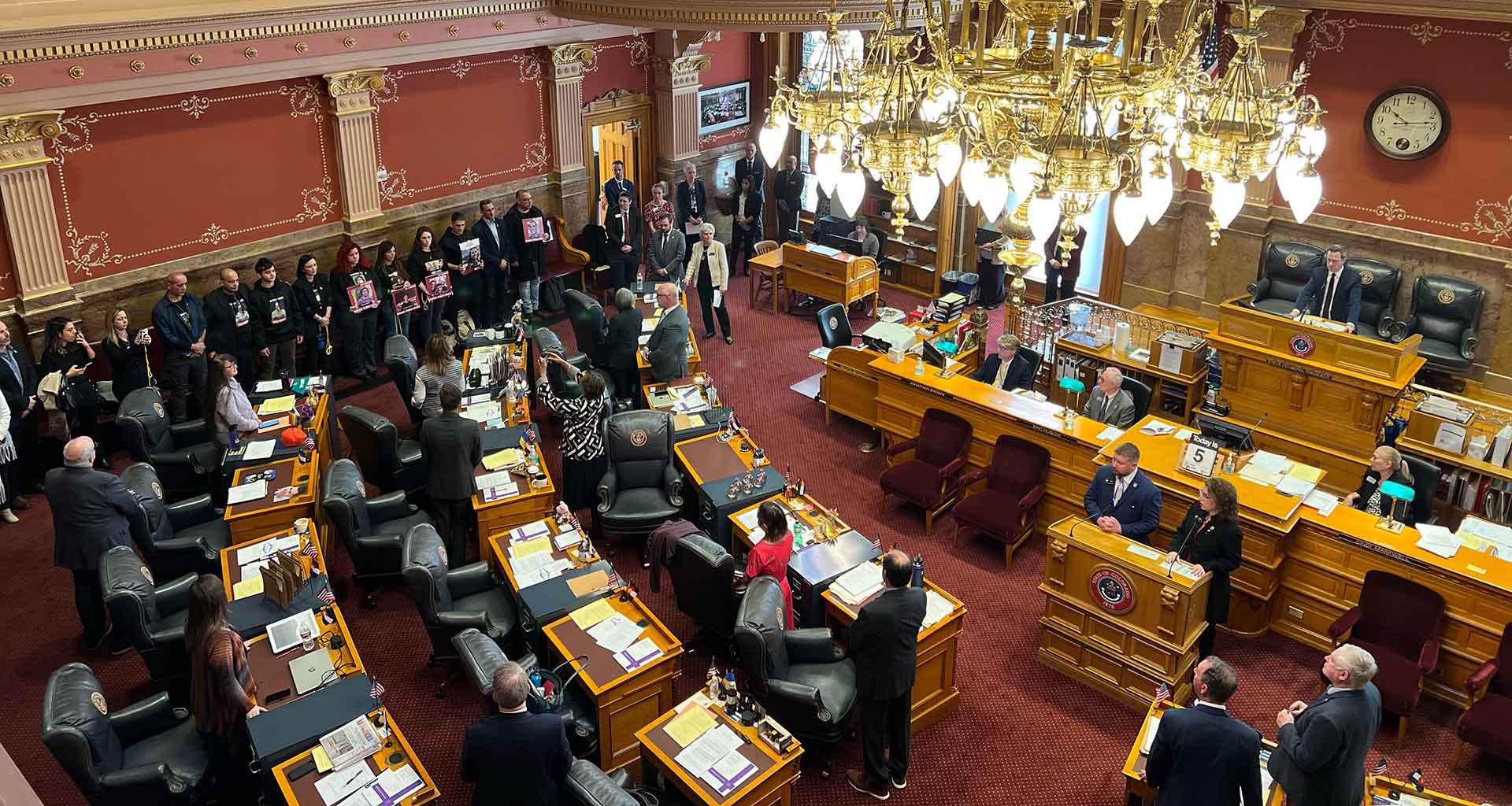 Hostage families on the Senate floor at the Colorado State Capitol
