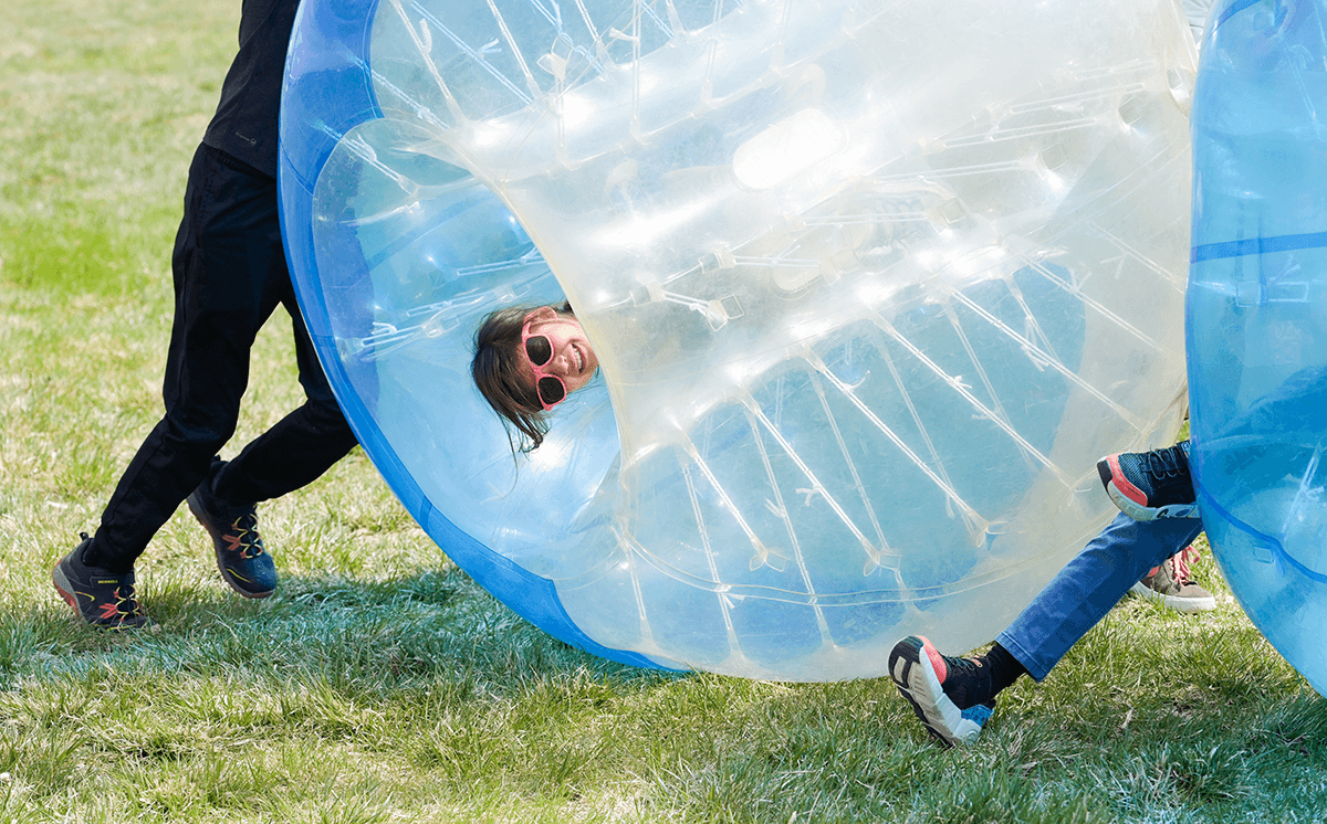 Rolling girl in big ball at Celebrate Israel @ 75