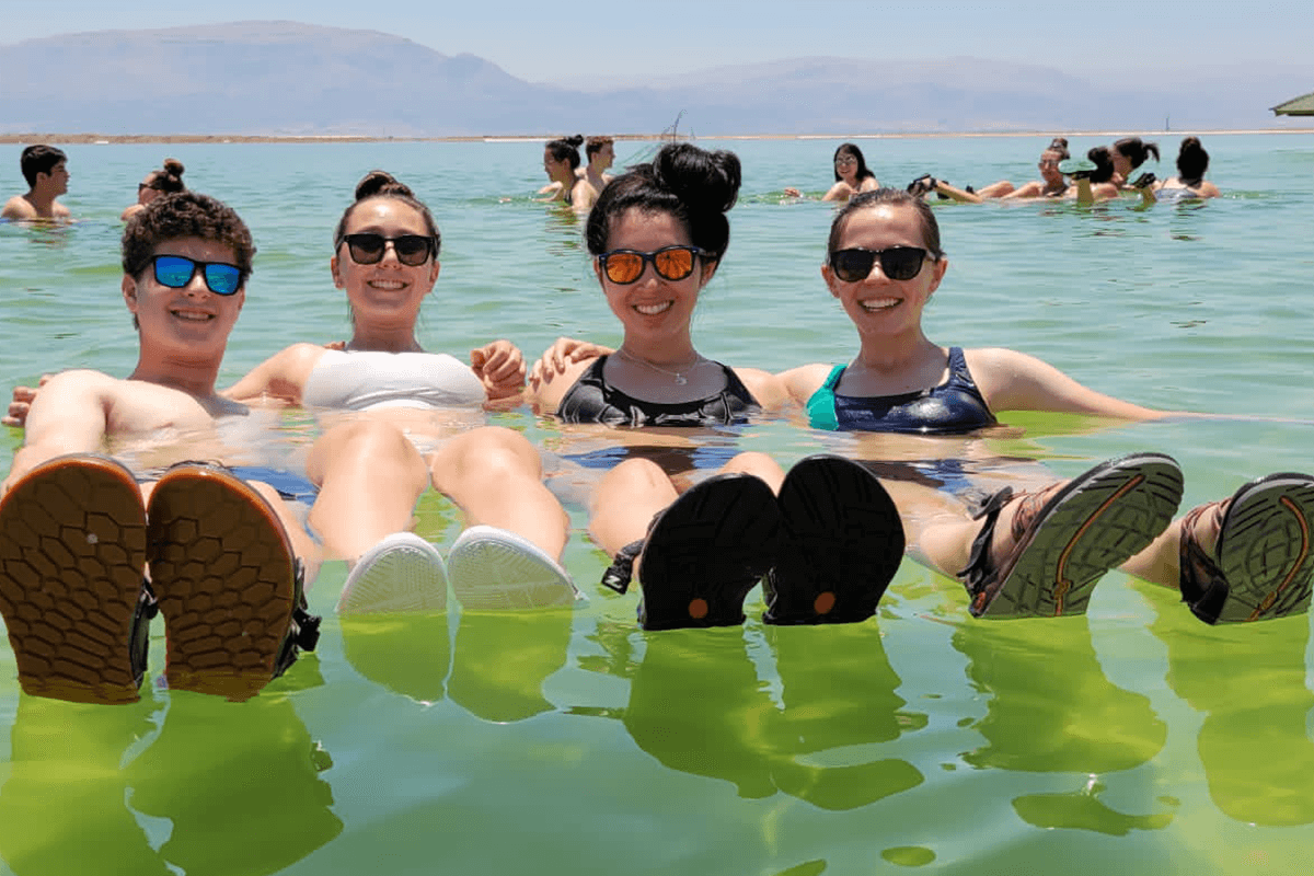 floating in the Dead Sea during the Israel Study Tour