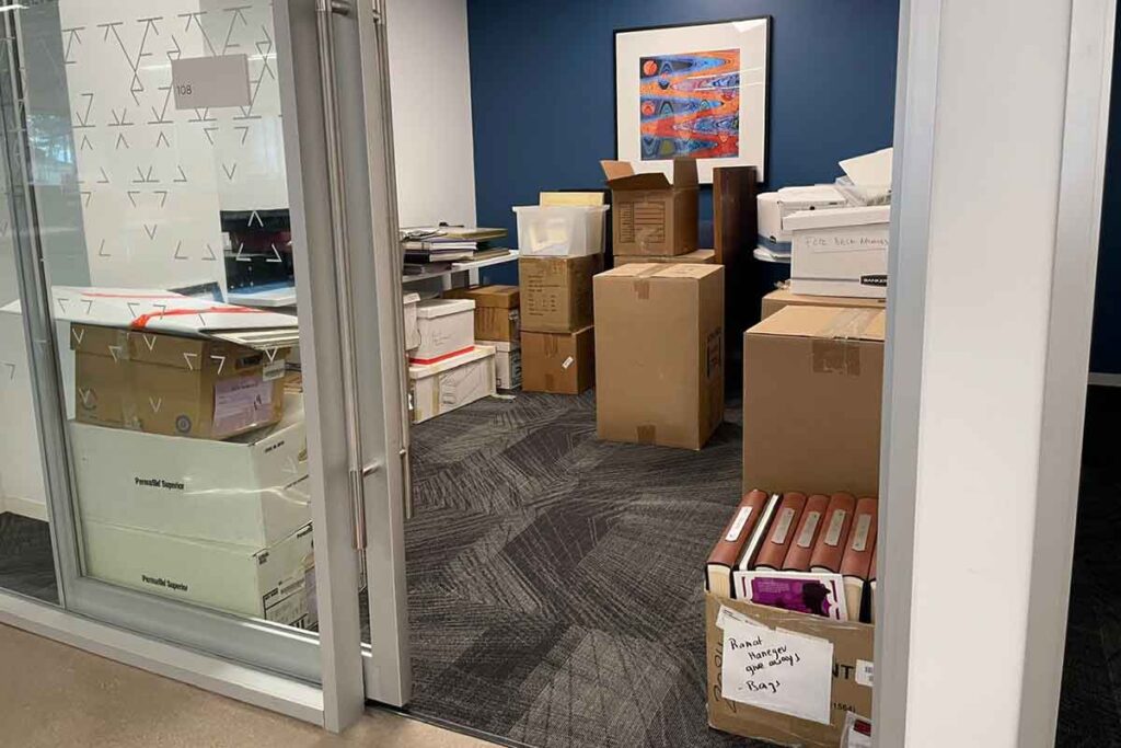 Room with boxes of archival material at Jco